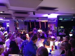 A band perform at Pizza Express, London.