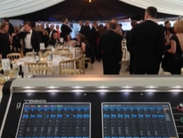 A marquee party, view from an DiGiCo S21 mixing desk.