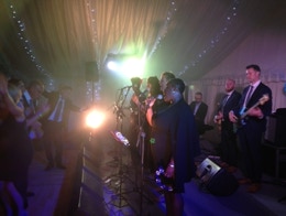 Natalie Williams Soul Family in a marquee.